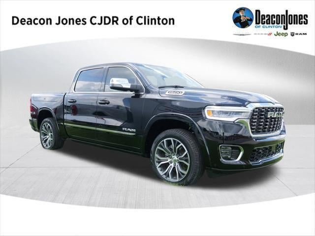2025 RAM Ram 1500 RAM 1500 TUNGSTEN CREW CAB 4X4 5'7' BOX in Diamond Black Crystal Pearl-Coat Exterior Paint — front three-quarter view