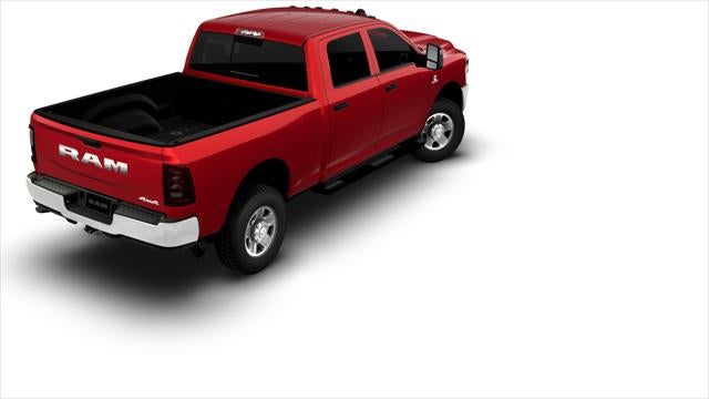 2026 RAM Ram 2500 RAM 2500 TRADESMAN CREW CAB 4X4 6'4' BOX in Molten Red Pearl-Coat Exterior Paint — front three-quarter view