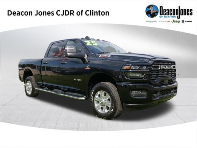 2025 RAM 2500 RAM 2500 BIG HORN CREW CAB 4X4 6'4' BOX in Diamond Black Crystal Pearlcoat — front three-quarter view